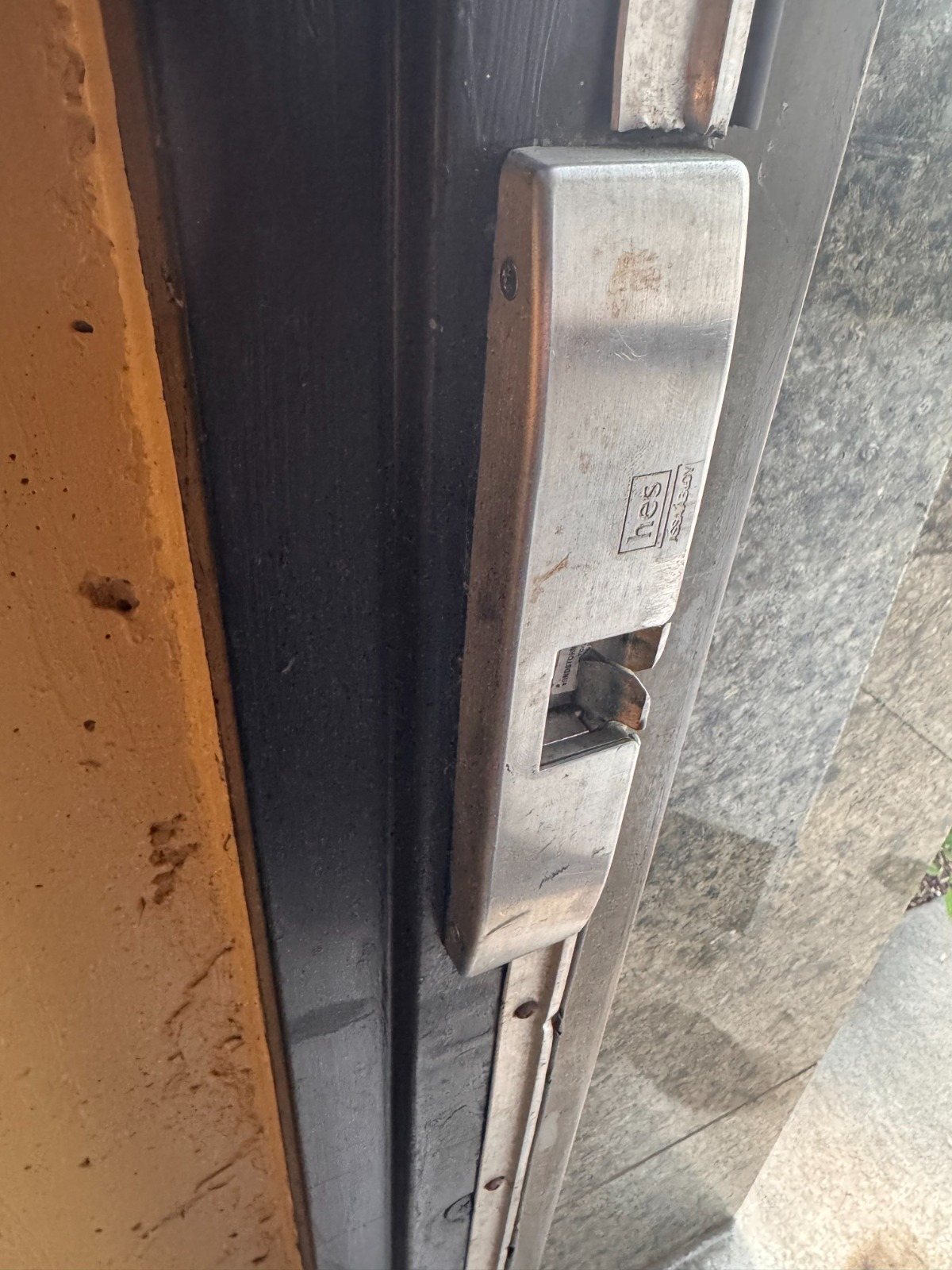 Electrified locking hardware on a commercial door frame