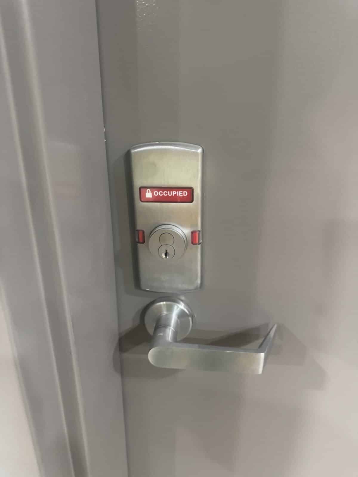 Commercial lever lock with interchangeable core