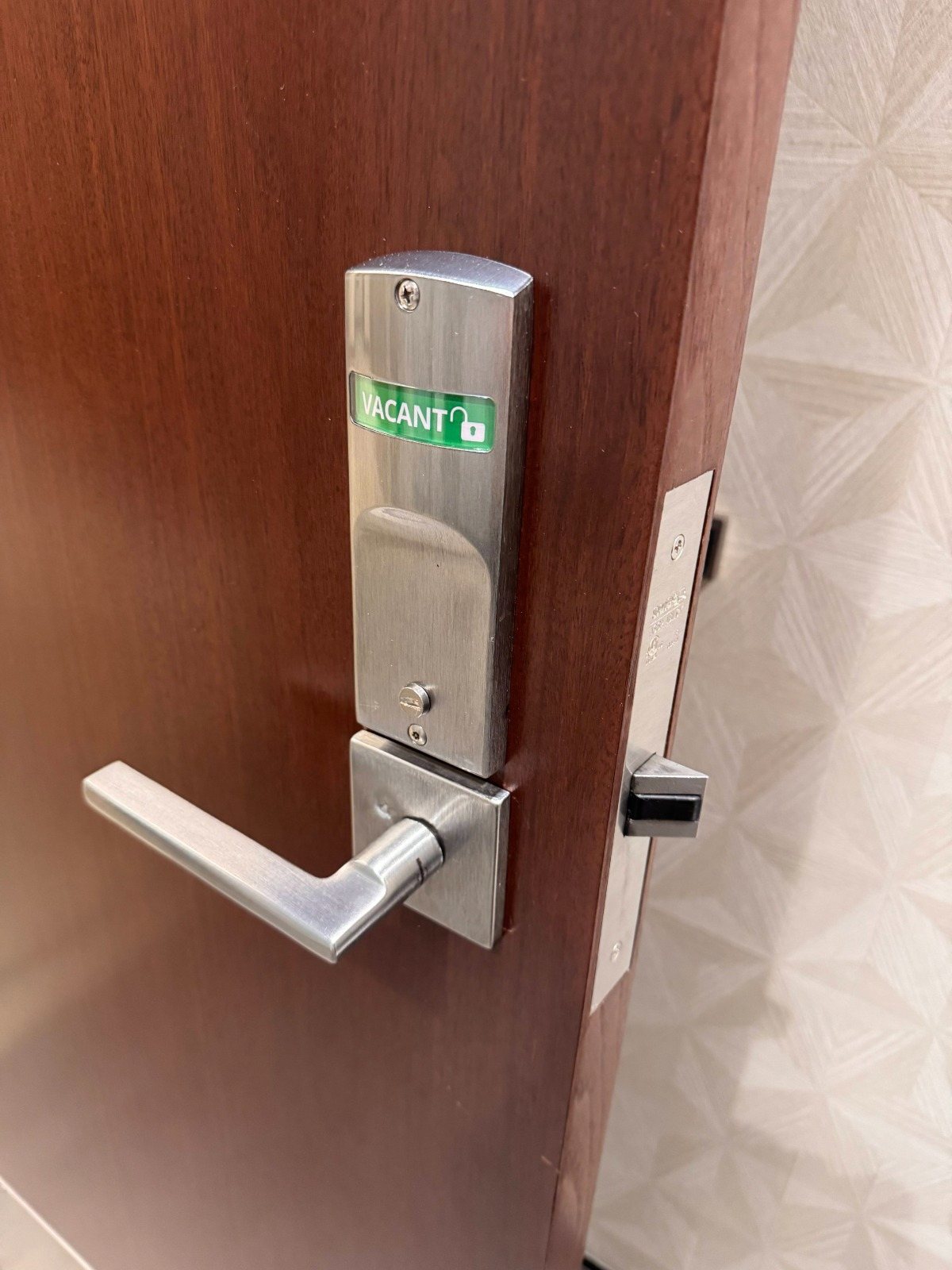 Mortise lock with occupancy indicator on a commercial door