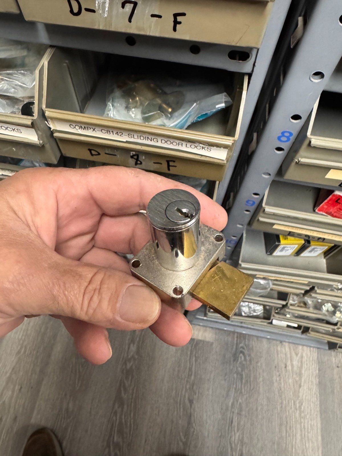 Lock cylinder being rekeyed at the Downs shop